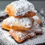 Himmlische Beignets, frisch gebacken und mit Puderzucker bestäubt